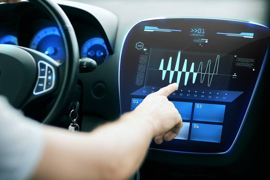 transport, modern technology and people concept - male hand pointing finger to diagram on screen of car control panel